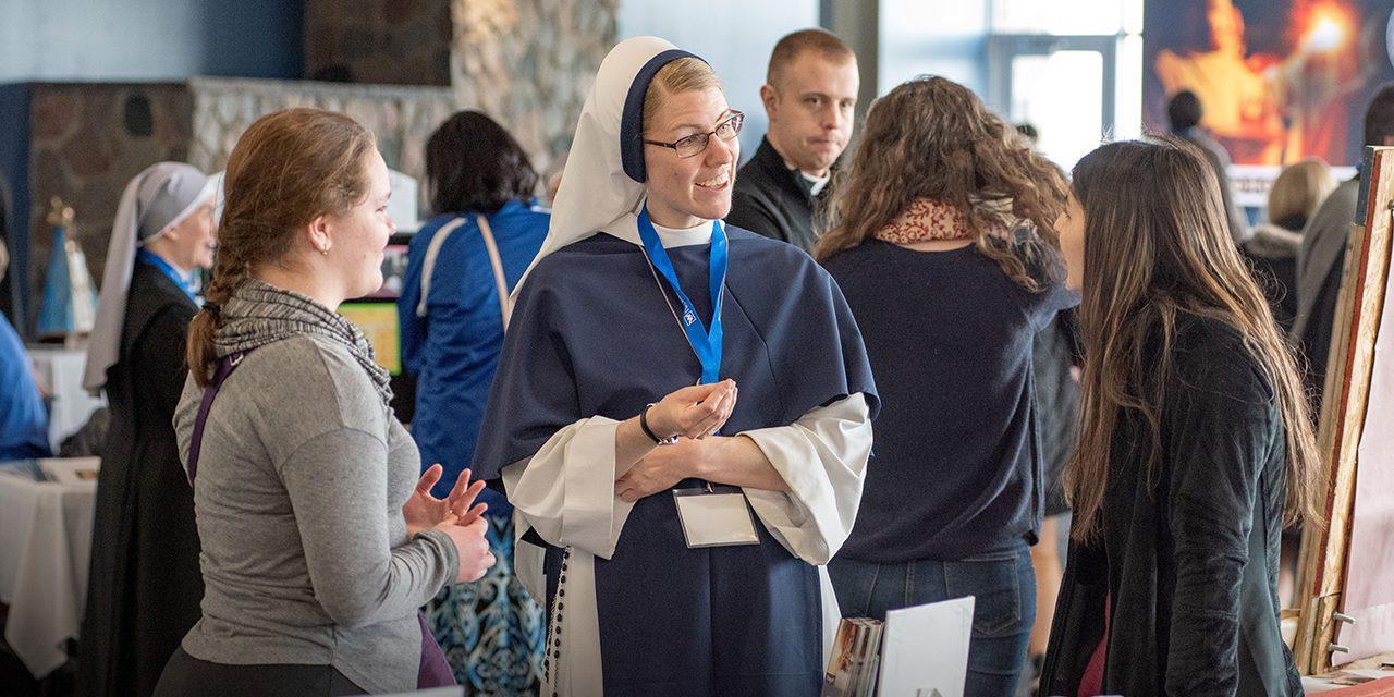 Speakers and students speaking at a vocation expo